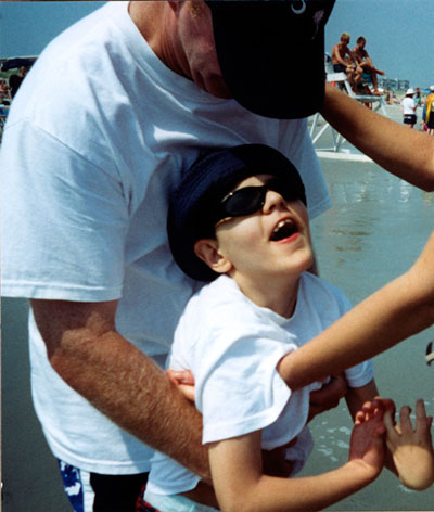 An image of Carson at the beach. Kimberly's son