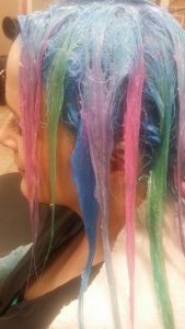 Rainbow hair color "during" processing 